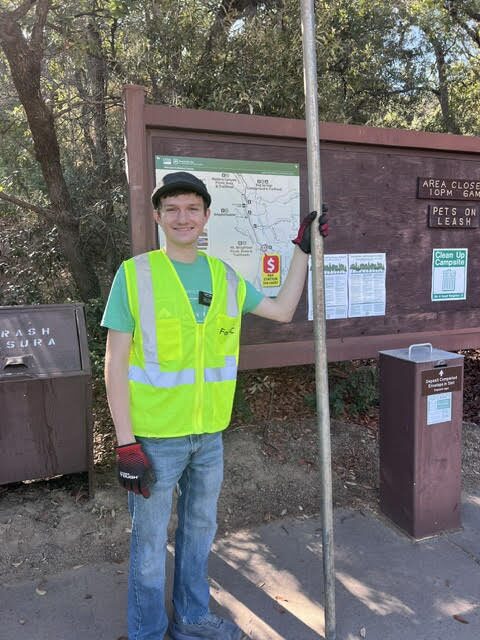 Volunteer Elder Tonks cleaning up at Wrightson Picnic Area
