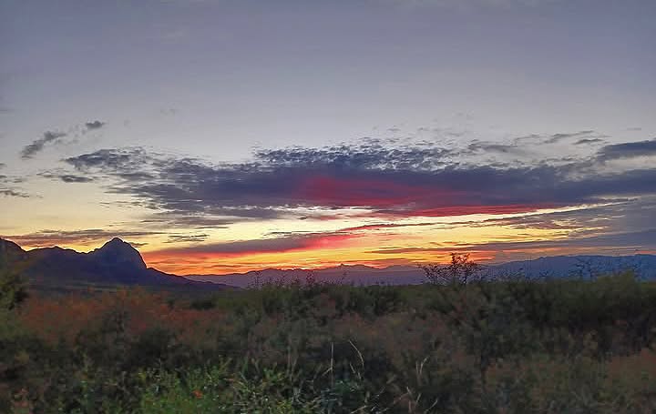 Sunset with pink clouds over Elephant Head from Proctor